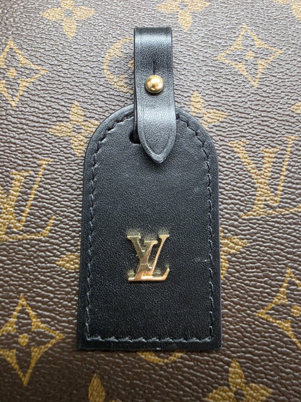 Louis Vuitton Black Leather Name Tag with Gold LV Emblem
